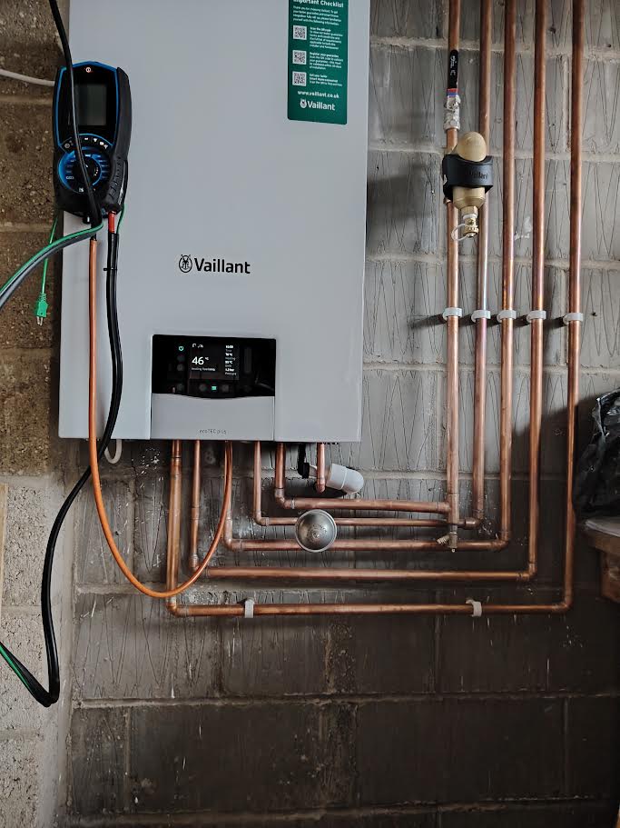 Vaillant boiler installation with clean copper pipework by NB Plumbing and Heating Services Ltd in Huntingdon.
